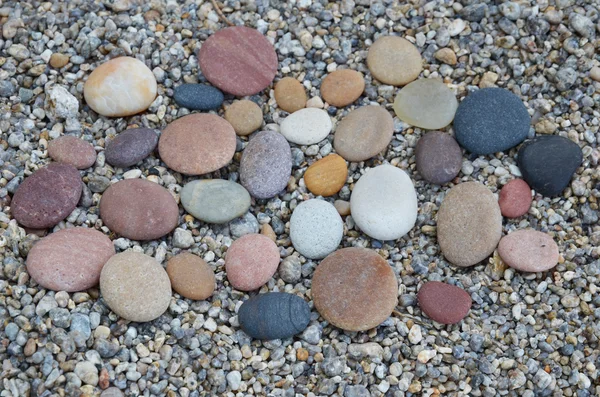 Farbige glatte Steine, die vom Baikalsee geschickt poliert wurden — Stockfoto