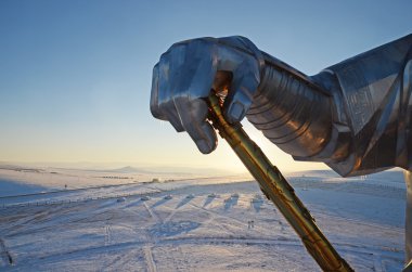 Legendary golden whip of Genghis Khan.  Statue Complex, Mongolia clipart