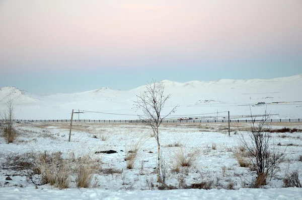 Puesta de sol en la estepa mongola en invierno — Foto de Stock