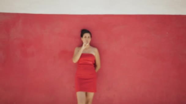 13-Slowmotion Portrait Woman Smoking Electronic Cigarette E-Cig Red Wall — Stock Video