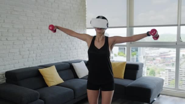 Young Woman Doing Sport Activity Virtual Reality Headset Fitness Home — Stock Video