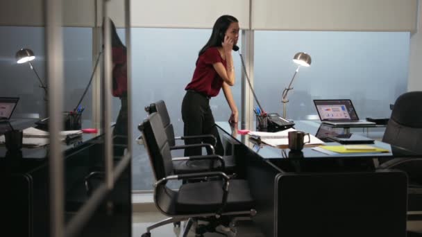 Smiling Woman Working Her Computer Late Night Answering Phone Call - 450x250 - jpeg Secretary Working Late At Night