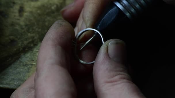 Closeup of wedding ring polishing by caicasian jeweler isolated, 4k footage — Stock Video