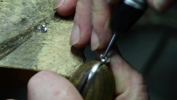 Closeup of wedding ring polishing by caicasian jeweler isolated, 4k footage — Stock Video