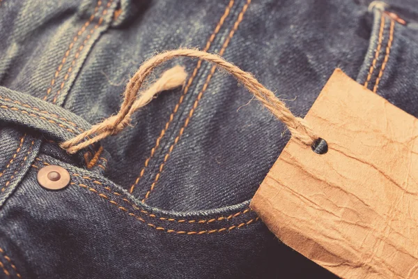 Jeans label on string — Stock Photo, Image