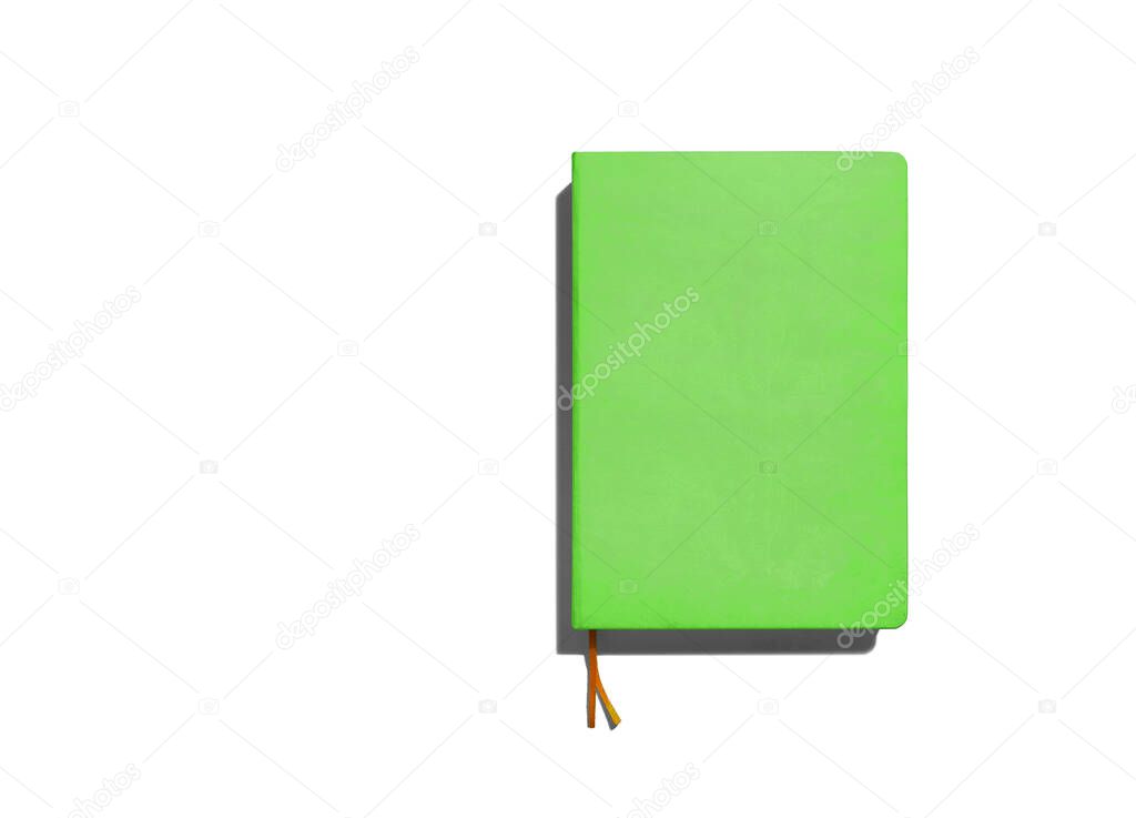 green closed notepad with bookmark on white background, template, place for text