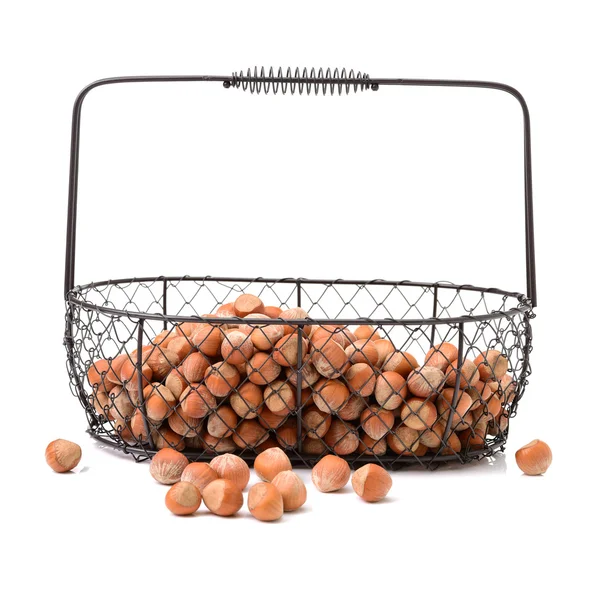 Pile of hazelnuts in basket — Stock Photo, Image