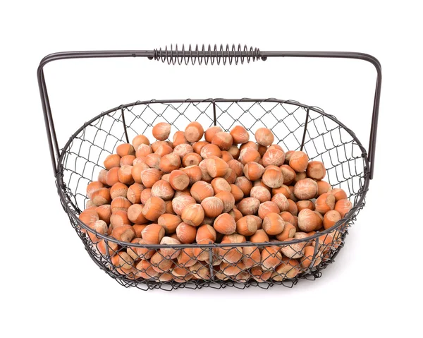Pile of hazelnuts in basket — Stock Photo, Image