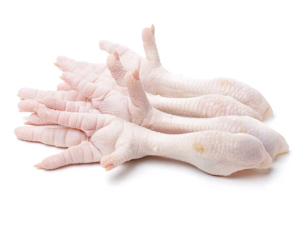 Pilha de pernas de frango cru — Fotografia de Stock