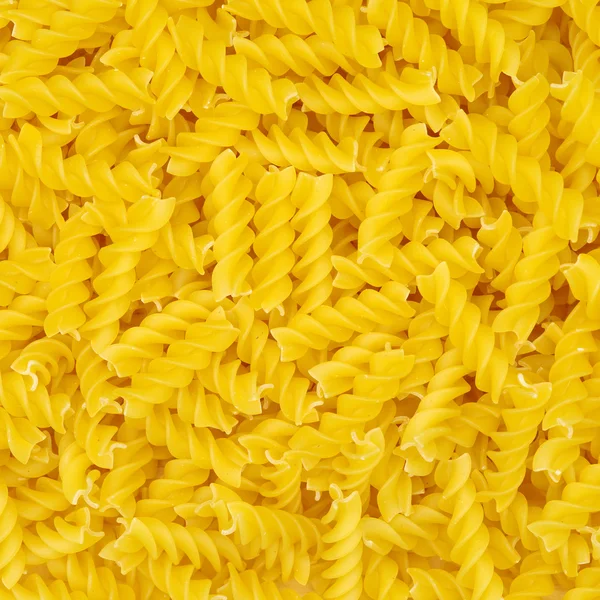 Pasta dorata in pila — Foto Stock