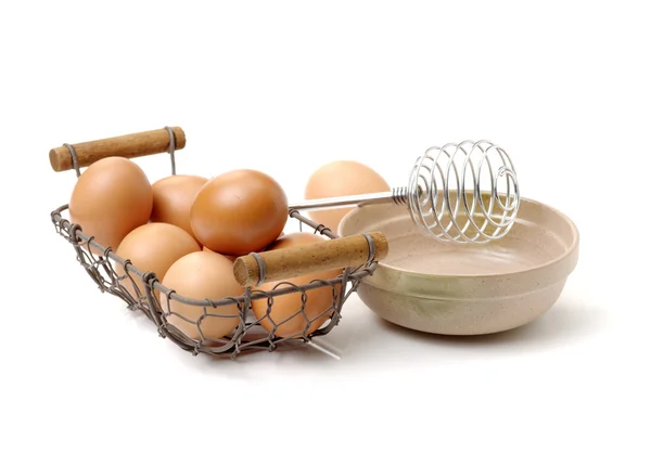 Raw eggs in basket — Stock Photo, Image