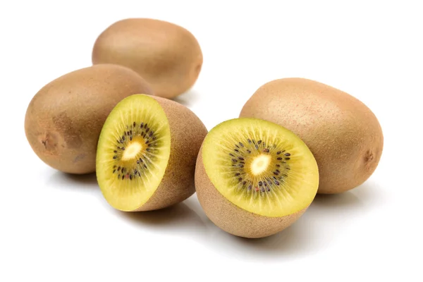 Whole and cut golden kiwifruits — Stock Photo, Image