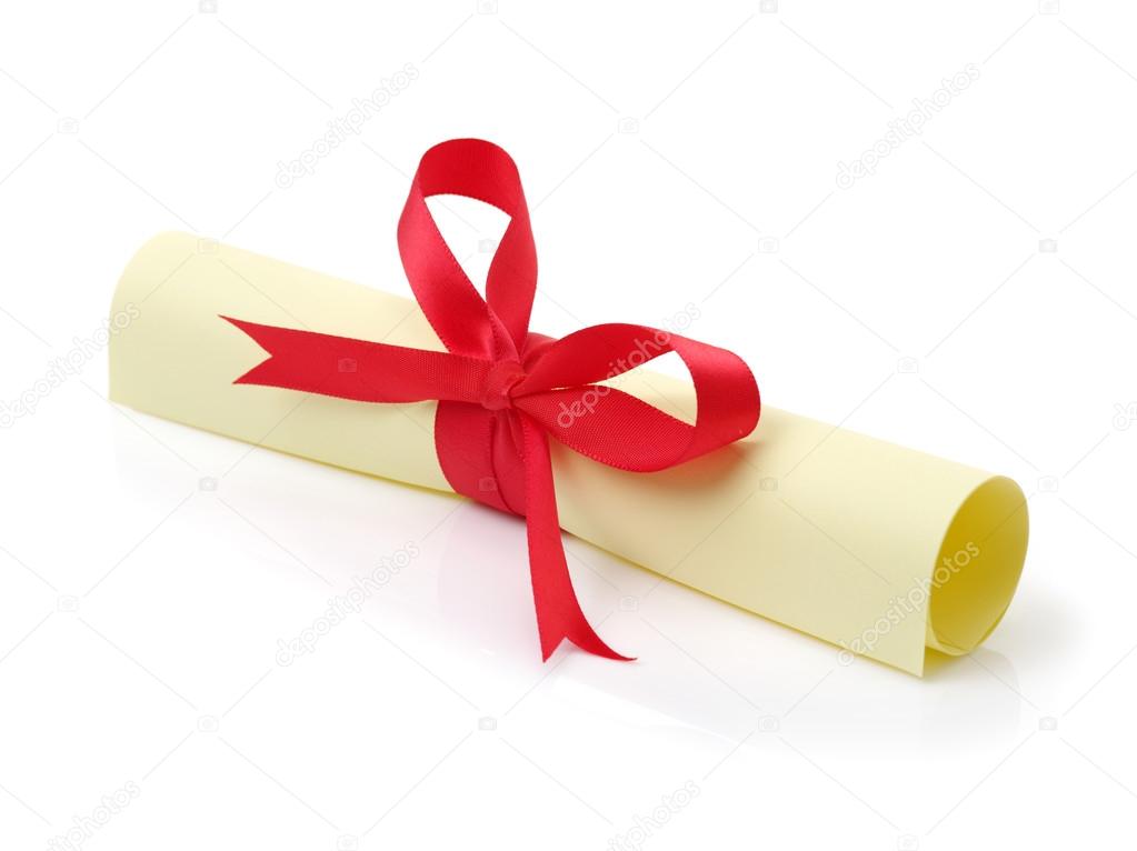 close up of paper scroll with red ribbon