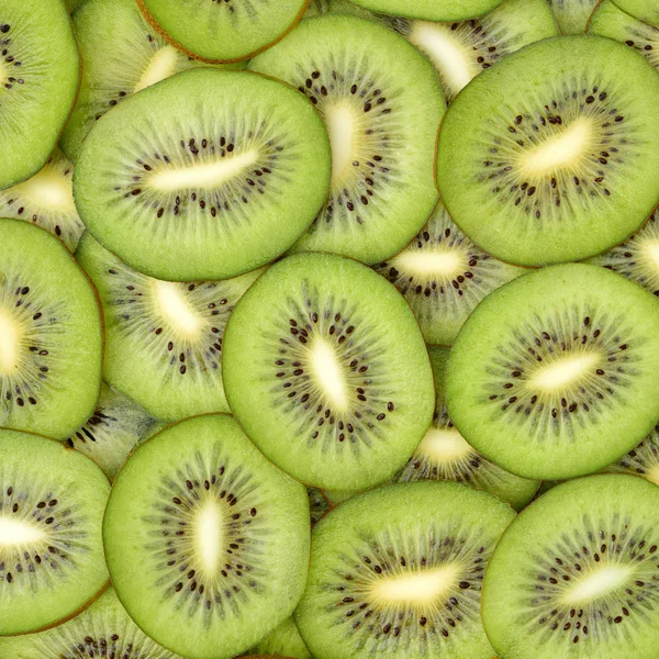 Fette di kiwi come sfondo — Foto Stock