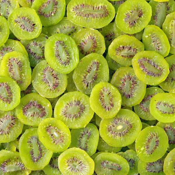 Kiwi segmenten als achtergrond — Stockfoto