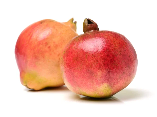 Juicy pomegranate on white background — Stock Photo, Image