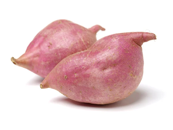 Sötpotatis på vita — Stockfoto