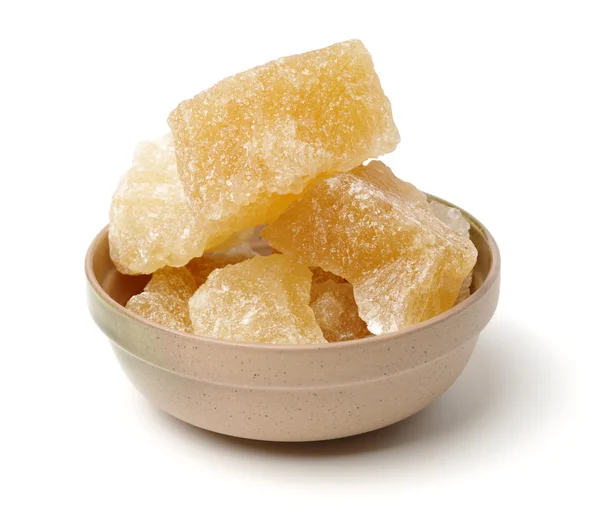 Brown crystal sugar on white — Stock Photo, Image