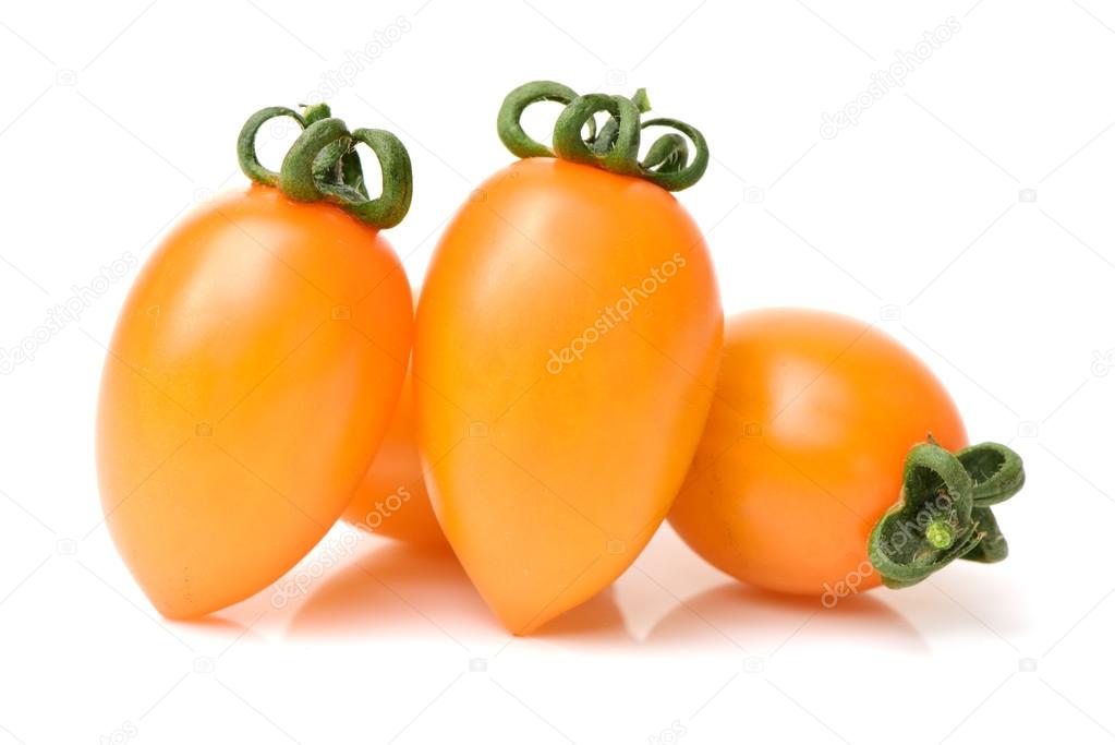 Mini yellow cherry tomatoes isolated on white