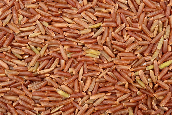 Brauner Reis Als Hintergrund — Stockfoto