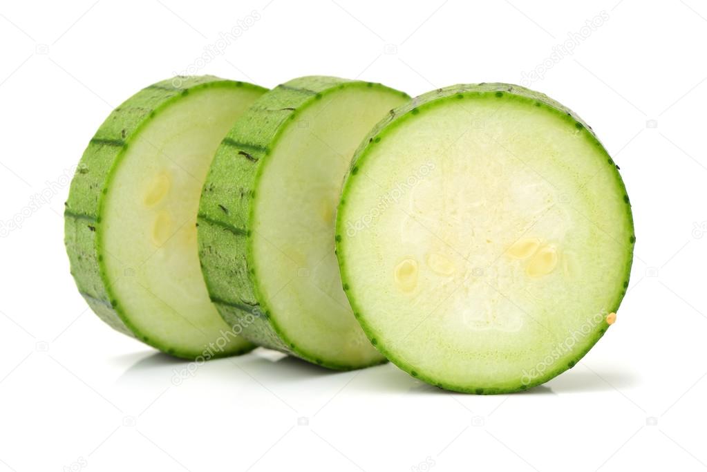 Loofah gourd slices isolated on white background