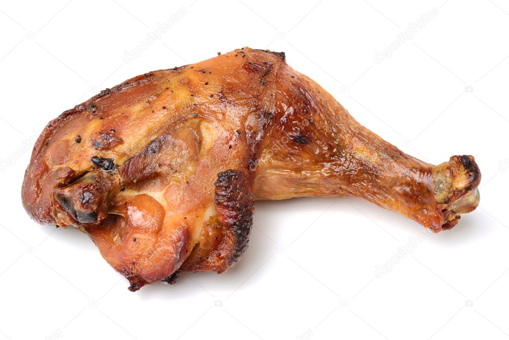Roast chicken leg on white