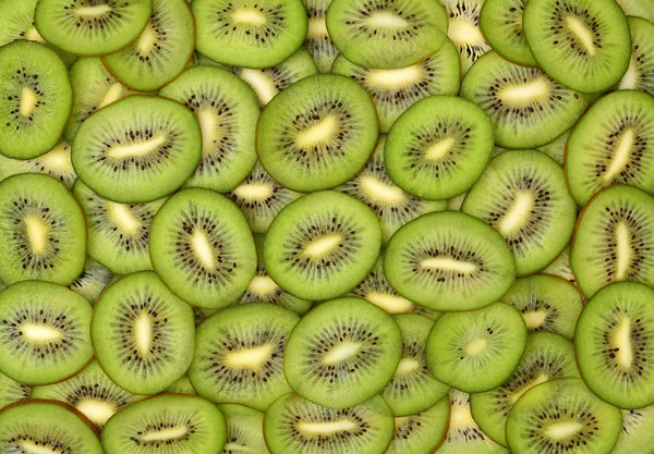 Fette di kiwi come sfondo — Foto Stock