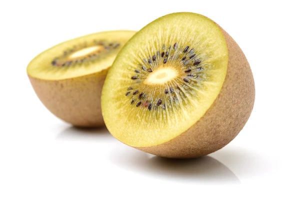 Whole and cut golden kiwifruit/ — ストック写真