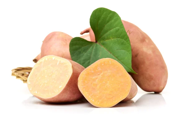 Sweet potatoes on the white — Stock Photo, Image