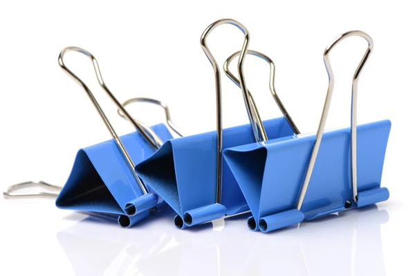 Four binder clips isolated on — Stock Photo, Image