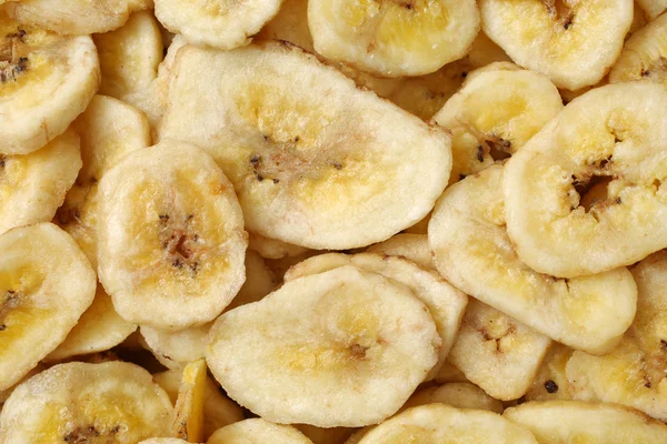 Dry banana slices background. — Stock Photo, Image