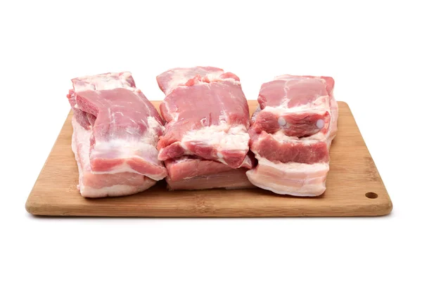 Schweinebauch auf weißem Hintergrund — Stockfoto