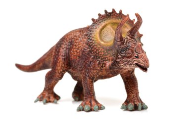 Styracosaurus dinozor figürü oyuncak üzerinde 