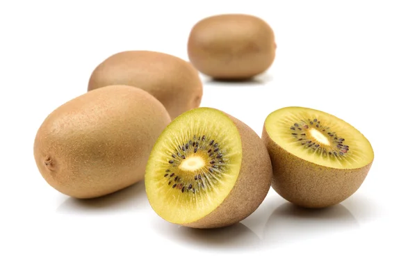 Whole and cut golden kiwifruit/ — Stock Photo, Image