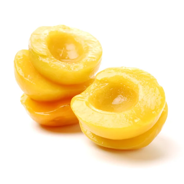 Peaches in syrup on a — Stock Photo, Image