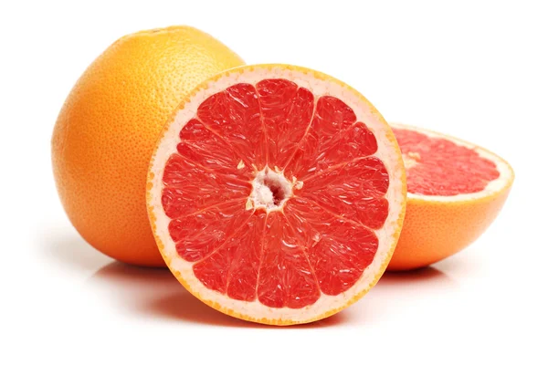 Grapefruit with segments on a white background — Stock Photo, Image