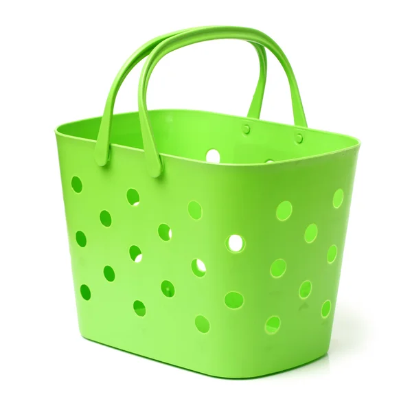 Fabric in green plastic basket — Stock Photo, Image