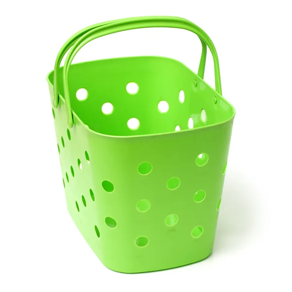 Tkaniny w zielony koszyk z tworzywa sztucznego — Zdjęcie stockowe