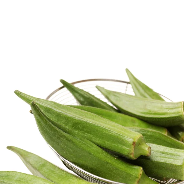 Okra fresca aislada sobre un fondo blanco —  Fotos de Stock