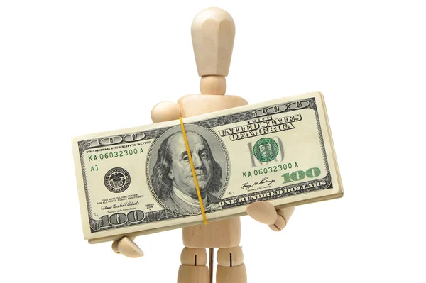 Dollars bank notes in wooden puppet hand — Stock Photo, Image