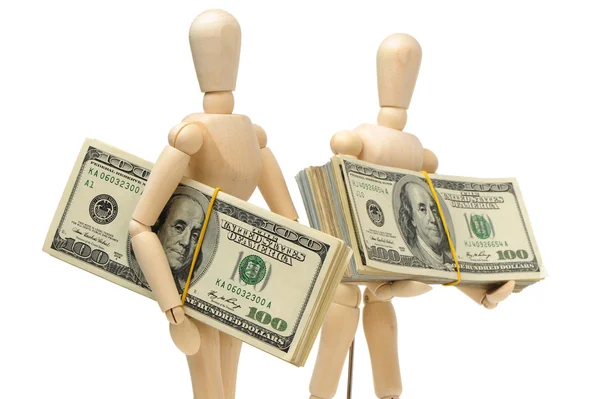 Dollars bank notes in wooden puppets hands — Stock Photo, Image