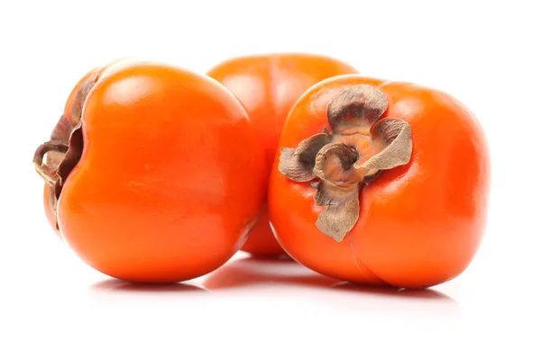 Persimmon auf Weiß — Stockfoto