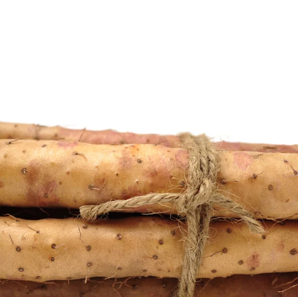 Whole chinese yams Stock Photo by ©jianghongyan 58771903