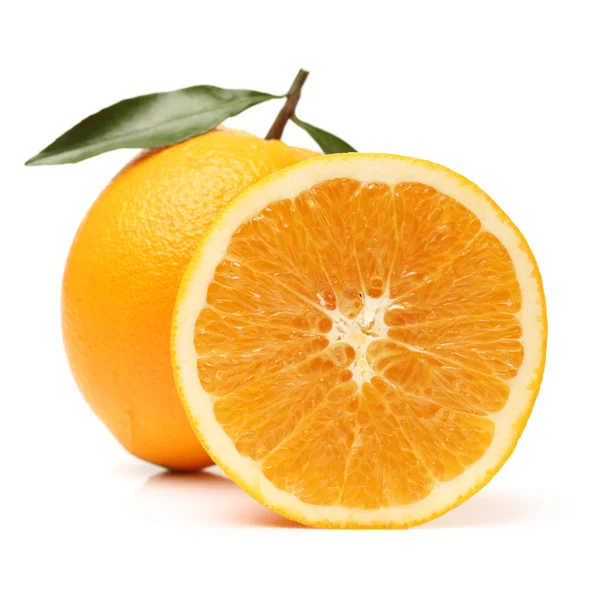 Fresh juicy oranges with leaves — Stock Photo, Image