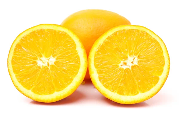 Fresh juicy oranges with leaves — Stock Photo, Image