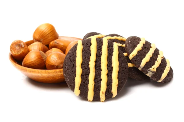 Chocolate cookies and nuts — Stock Photo, Image