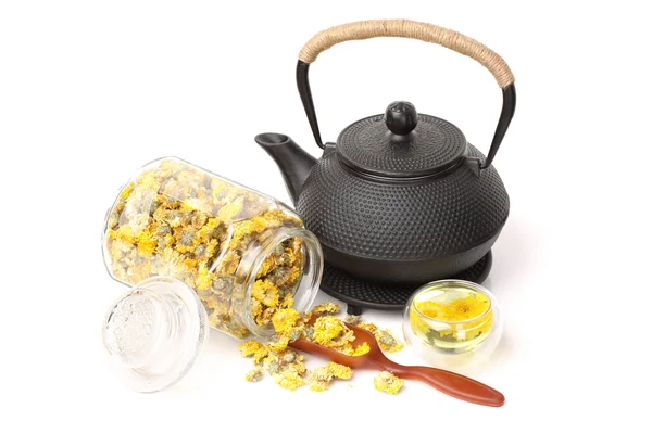 Dried Chrysanthemum Flowers and teapot — Stock Photo, Image