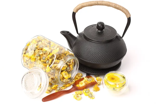 Dried Chrysanthemum Flowers and teapot — Stock Photo, Image