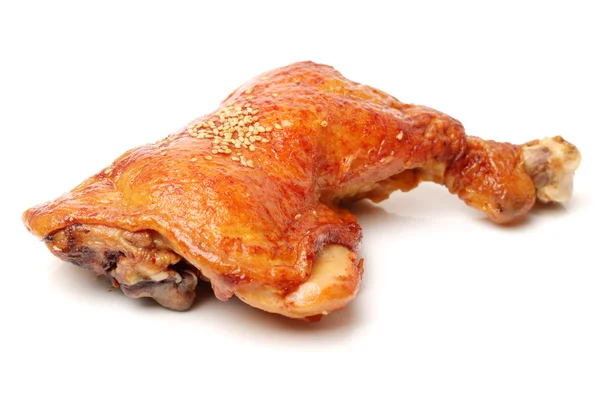 Barbecued chicken leg on white background — Stock Photo, Image