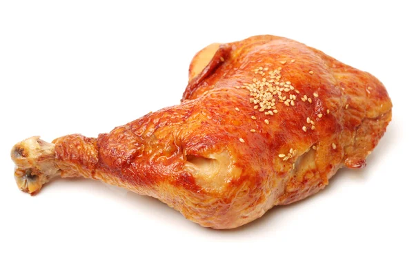 Barbecued chicken leg on white background — Stock Photo, Image